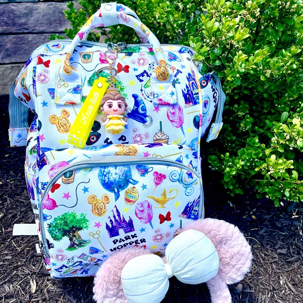 Disney Backpacks! In white or cream with character keychain included. 💙